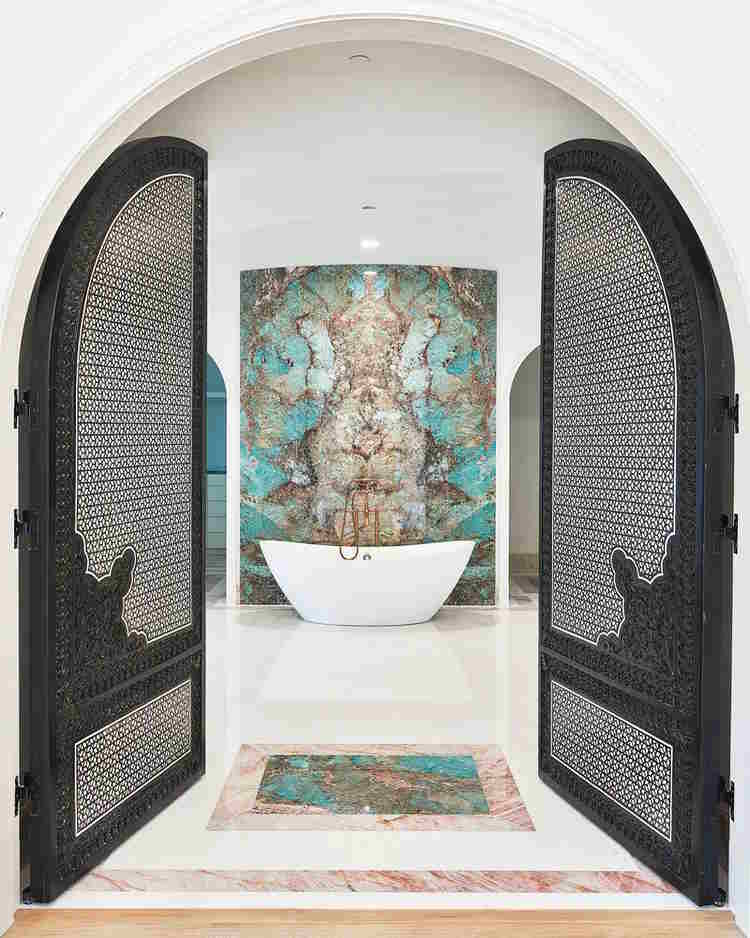 Mother of pearl door for a bathroom designed by Gallerie Noir