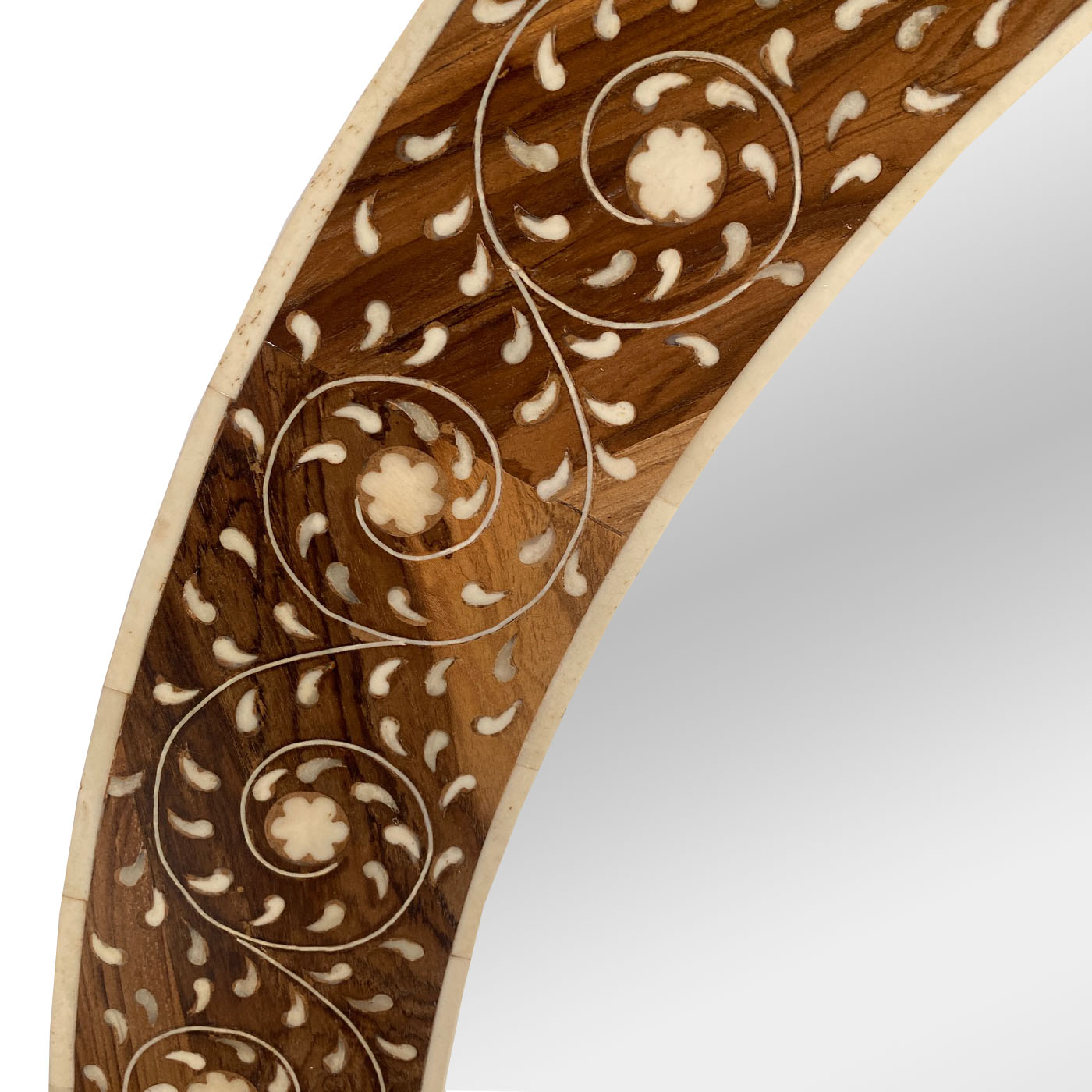 A round bone inlay mirror from the luxury design showroom AOI Home.