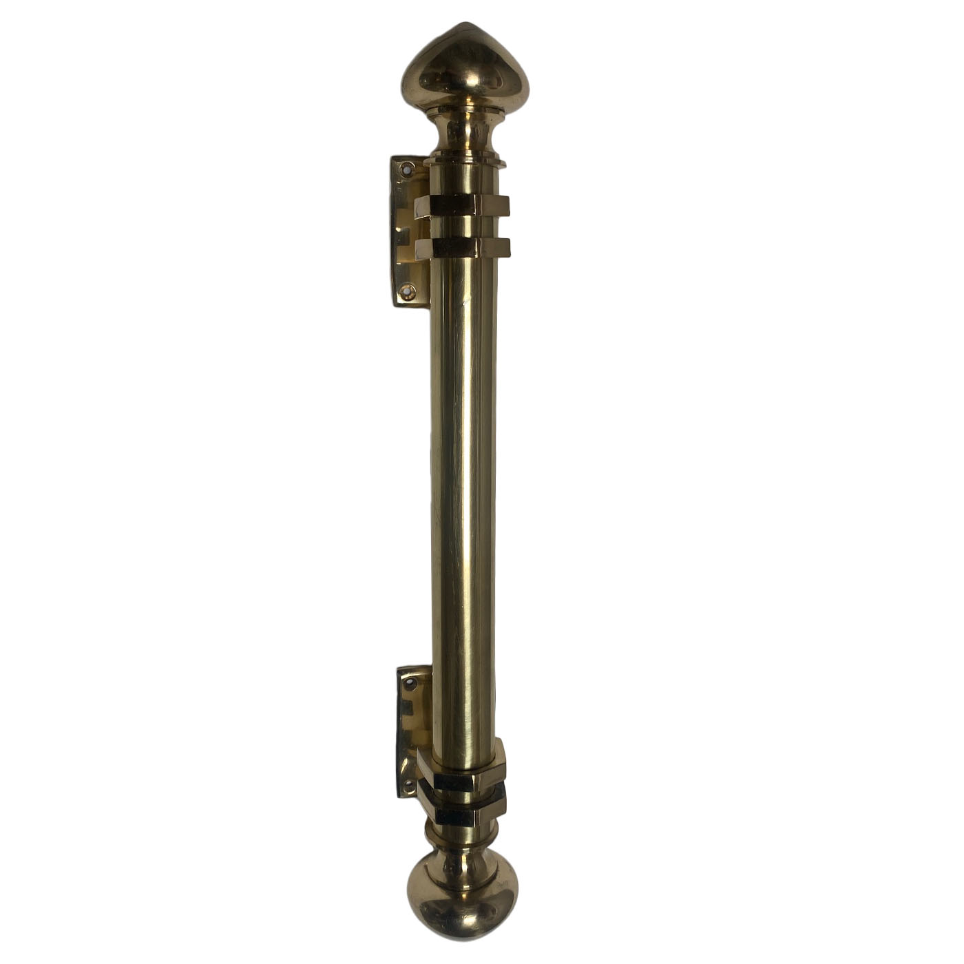 A large statement brass door handle from the design showroom AOI Home.