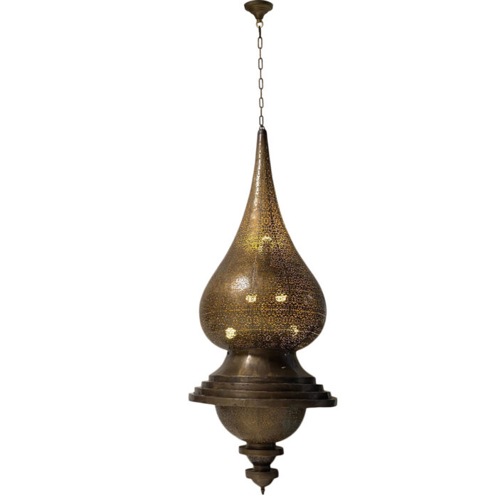 A large hand-made brass hanging lantern with intricate designs.